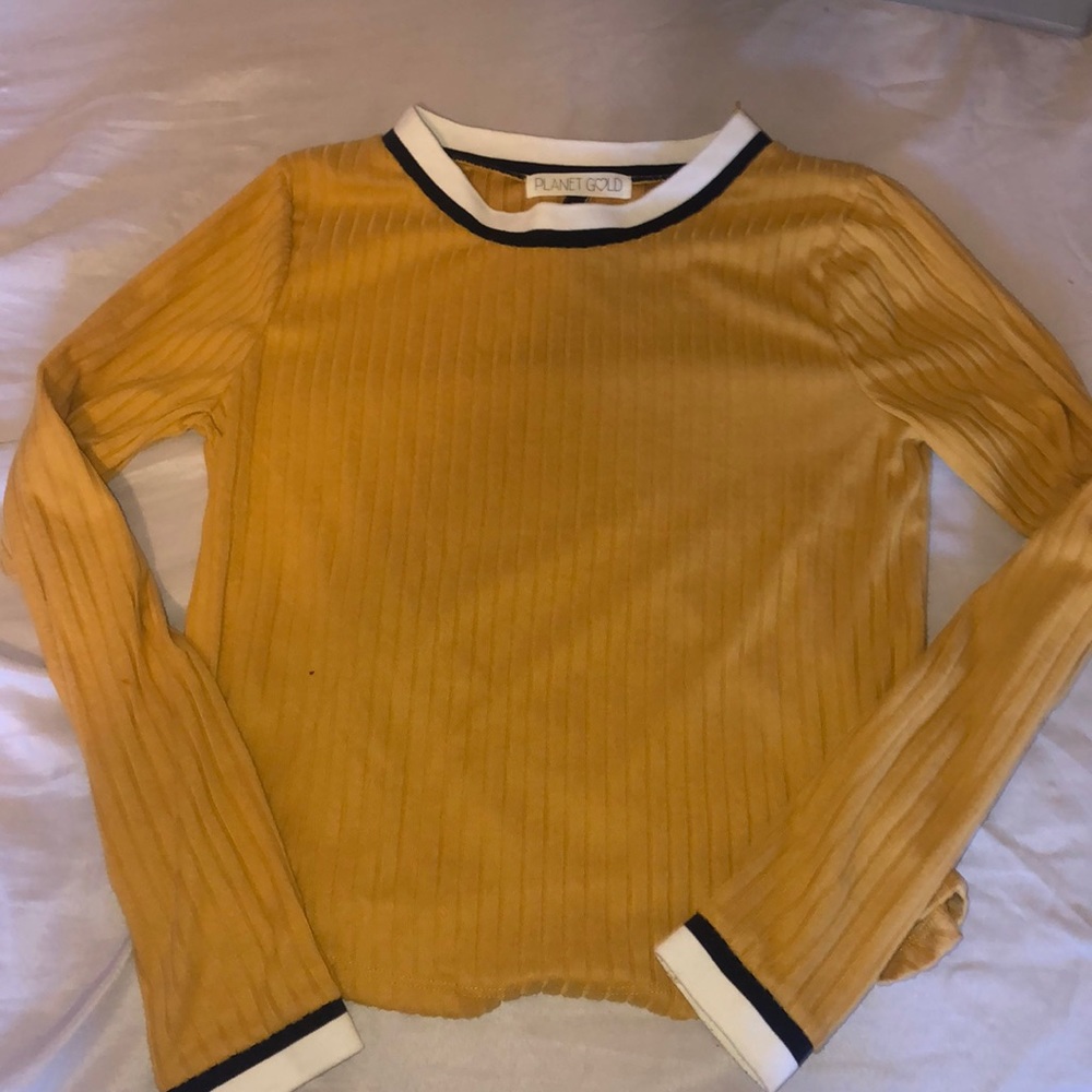 A yellow long sleeve